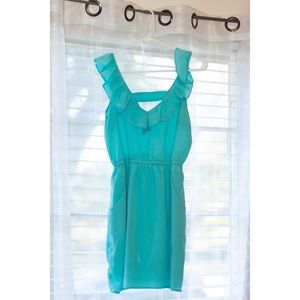 Light teal ruffle neckline dress